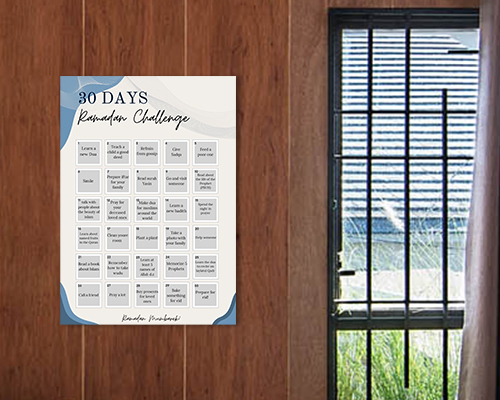 A poster adheres to a brown wooden wall, displaying the 30-Day Ramadan Challenge design. Next to it, a window features black wrought iron floral patterns.