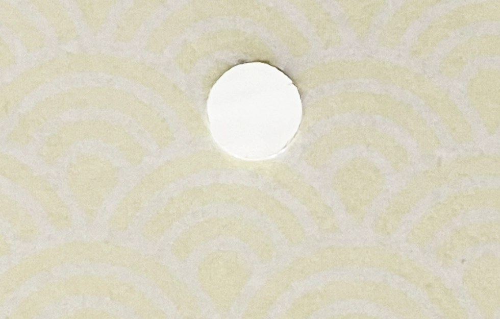 Wall calendar with 6mm hole punching for easy and secure wall hanging.