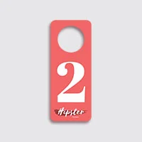 A hanger with a number two and pink colour background.
