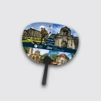 A plastic hand fan with various building pictures as design.