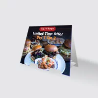A tent card advertises limited time offer promotion in a restaurant.