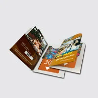 Two key folders with some flyers which promote travel in Malaysia.