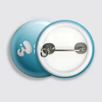 A round button badge in blue with pin behind.