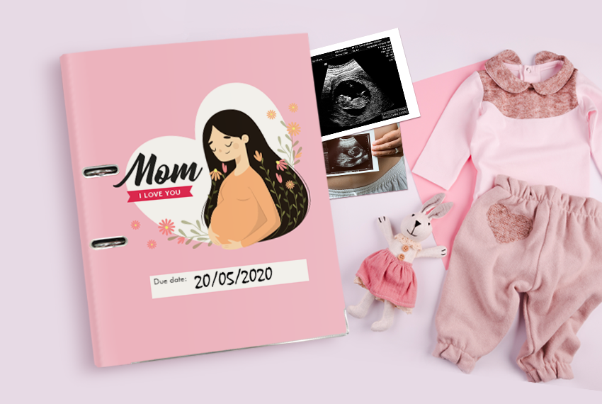 A pink arch file with a cover design that says “Mom” next to baby clothes, a bunny plush, and ultrasound scans.