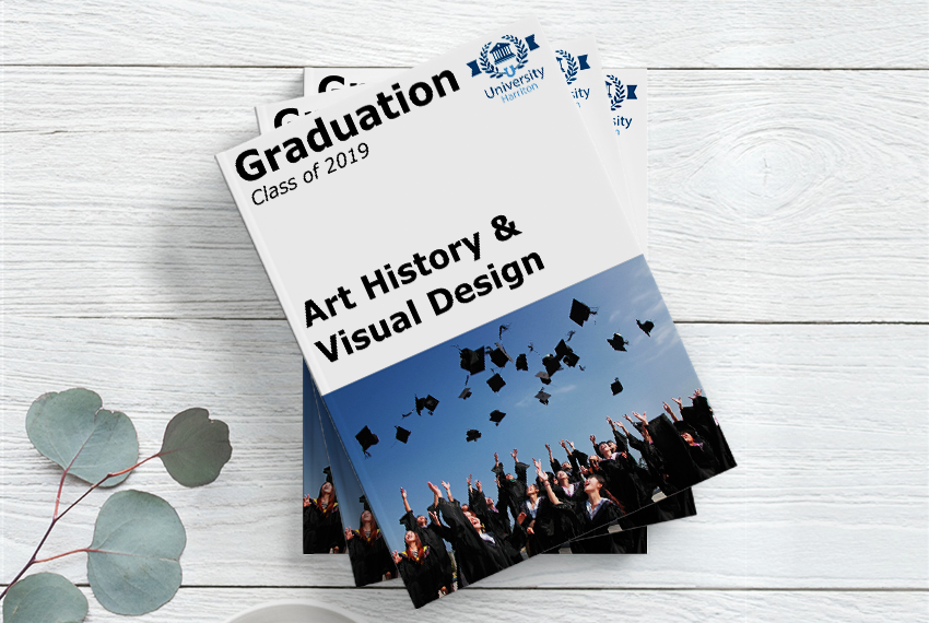 A stack of booklets labelled “Art History & Visual Design” on the cover, decorated with an image of graduating students throwing their caps into the air.