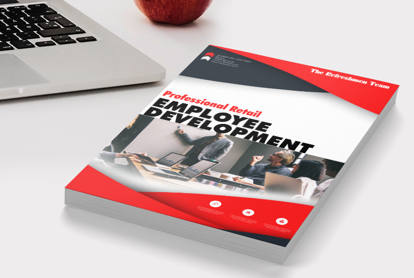 A thick book labelled “Employee Development” with a red bordered design.