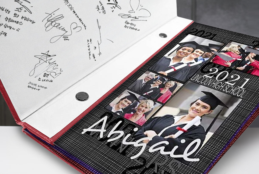 A yearbook for graduates filled with signatures and images of a woman apparently named Abigail surrounded by her peers.