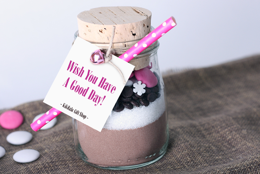 A tag that says “Wish You Have A Good Day!” hangs from a jar holding parfait.