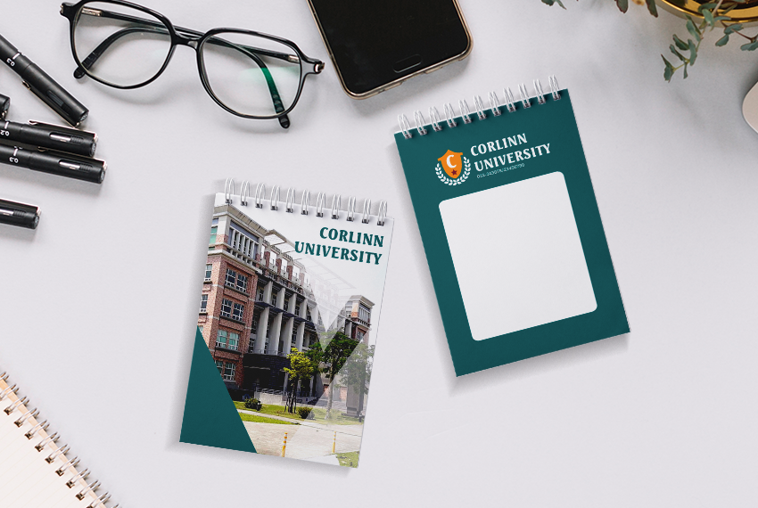 Two wirebound notebooks are arranged side by side, both highlighting Corlinn University.