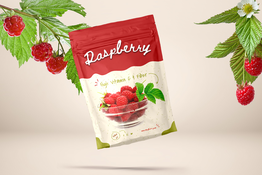 A resealable pouch printed with raspberries surrounded by raspberries still on their branches.